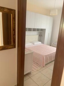 A bed or beds in a room at Residence Massilor