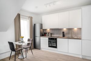 Kuchyň nebo kuchyňský kout v ubytování Citystay - Finch House
