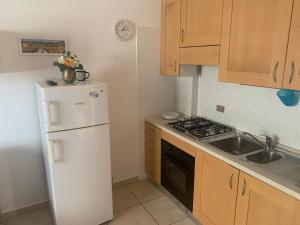 A kitchen or kitchenette at Residence Massilor