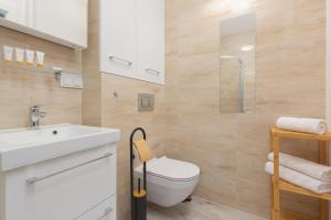 Kúpeľňa v ubytovaní Apartments City Center Warsaw by Noclegi Renters