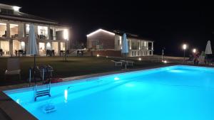The swimming pool at or close to RESORT REIS country house