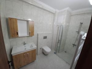 Ein Badezimmer in der Unterkunft Kıvanç Residence