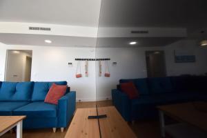 Część wypoczynkowa w obiekcie MAGNOLIO APARTMENT CALACEITE