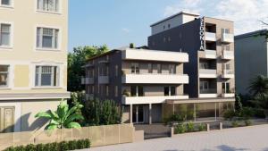 a renderización de un edificio junto a algunos edificios en Hotel Sedonia, en Cervia