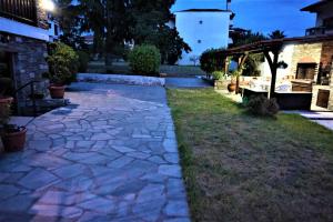 A garden outside katerina's Villa