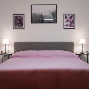 A bed or beds in a room at La Terrazza Azzurra