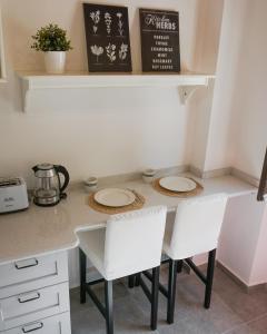 A kitchen or kitchenette at La Terrazza Azzurra