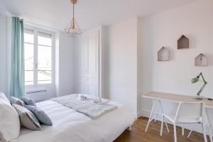 Postelja oz. postelje v sobi nastanitve GuestReady - Amazing Flat in Saint Michel