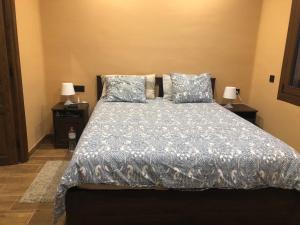 מיטה או מיטות בחדר ב-Casa Calvés