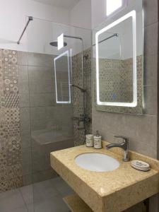 Salle de bains dans l'établissement Apartament Miramare Mamaia Nord