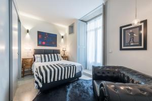 Uma cama ou camas num quarto em GuestReady - Luxus Porto Apts - Sto Ildefonso Terrace