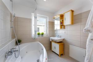 Koupelna v ubytování Ferienhaus Captains Hus + 16 fotografií