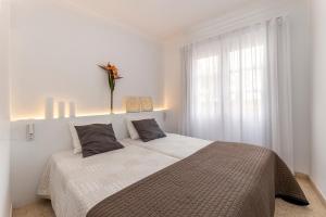 Posteľ alebo postele v izbe v ubytovaní Apartment Carabela I