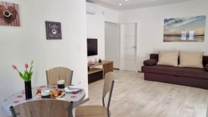 Posedenie v ubytovaní Apartments DaMa