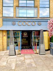 a store front with two goal nets in front of it at PERFECT CENTRAL LOCATION- 5 minutes from TOWER BRIDGE ! 8 minutes walk from tube in London