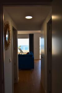 Łóżko lub łóżka w pokoju w obiekcie MAGNOLIO APARTMENT CALACEITE