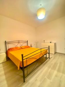 A bed or beds in a room at Casa La Quercia