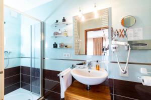 Koupelna v ubytování Landhaus Wremer Deel + 37 fotografií