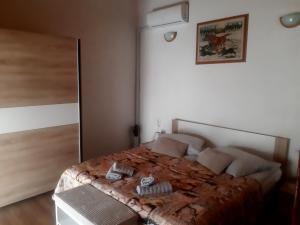a bedroom with a bed with a blanket on it at Sant Elena in Bale