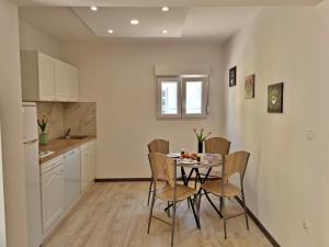 Kuchyňa alebo kuchynka v ubytovaní Apartments DaMa