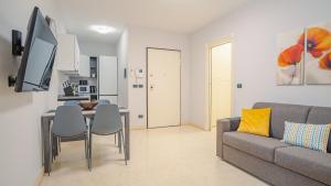 Televízia a/alebo spoločenská miestnosť v ubytovaní Relais du Lac Loft - Italian Homing