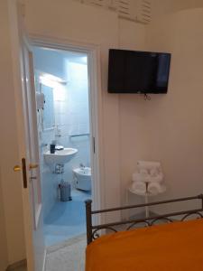 Koupelna v ubytování Mezza Torre B&B