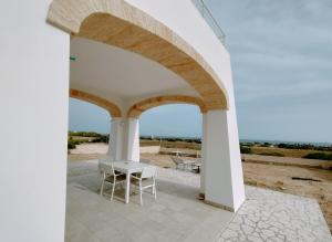 A balcony or terrace at Perla delle Maldive