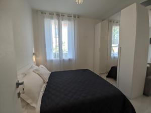 Postel nebo postele na pokoji v ubytování Villa Cortina