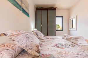 A bed or beds in a room at Villa Orquidea