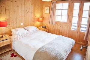 Postel nebo postele na pokoji v ubytování Roux