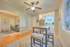 a kitchen and living room with a ceiling fan at Winter Haven Abode Near Lakes and Attractions in Winter Haven