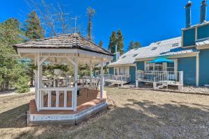 a gazebo in the yard of a house at Eclectic Home with Deck 4 Miles to Ski Cloudcroft! in Cloudcroft