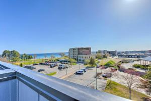 a balcony with a view of a parking lot at Traverse City Townhome Walk to Beach! in Traverse City