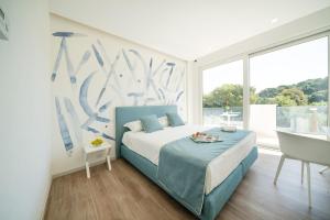 Postel nebo postele na pokoji v ubytování Rodi Resort + 37 fotografií