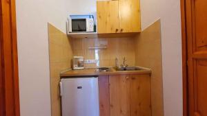 Kuchyň nebo kuchyňský kout v ubytování Apartments in Siofok/Balaton 35466