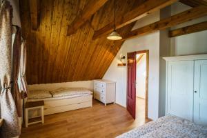 Postel nebo postele na pokoji v ubytování Chaloupka Kadov