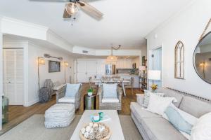 a living room with a couch and a table at 3 Portofino 1406 in Pensacola Beach