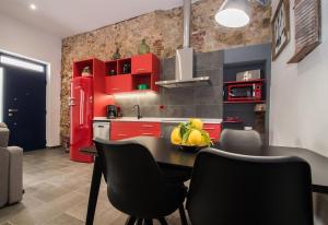 Kuchyň nebo kuchyňský kout v ubytování Petit Loft