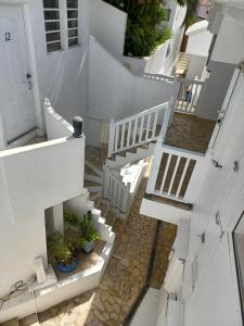 En balkong eller terrasse på 5 min de Baie Orientale-vue magique, Idolem résidence unité 14 - 57 Rue du Mont Vernon 1