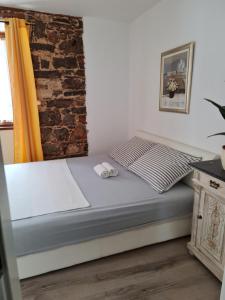 Postel nebo postele na pokoji v ubytování Rustic