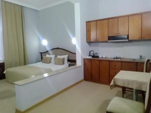 Postel nebo postele na pokoji v ubytování Shindan Hotel Astara