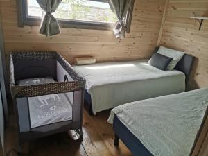 Postel nebo postele na pokoji v ubytování Przystań Piława