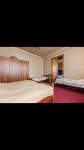 Postel nebo postele na pokoji v ubytování Veriko's Guest Hause