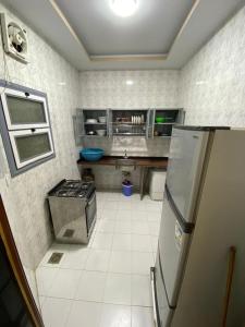 Virtuvė arba virtuvėlė apgyvendinimo įstaigoje Villa 32 - Marouf Group