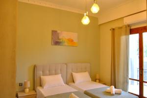 Posteľ alebo postele v izbe v ubytovaní Giovana's pool house