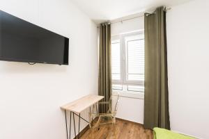 TV a/nebo společenská místnost v ubytování Saluto al Sole