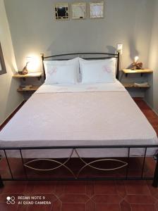 A bed or beds in a room at Almyriki studio