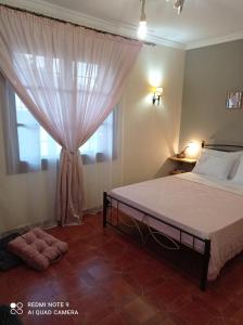 A bed or beds in a room at Almyriki studio