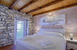 Posteľ alebo postele v izbe v ubytovaní Villa Rosana in Muntić - Haus für 4-5 Personen + 24 fotografií