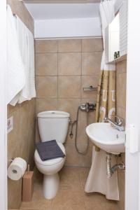 Koupelna v ubytování Sunny Apartment - Triovasalos